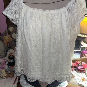 Woman’s off the shoulder lace blouse